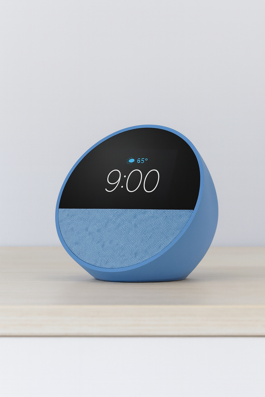 Blue Amazon Echo Spot on a desk.